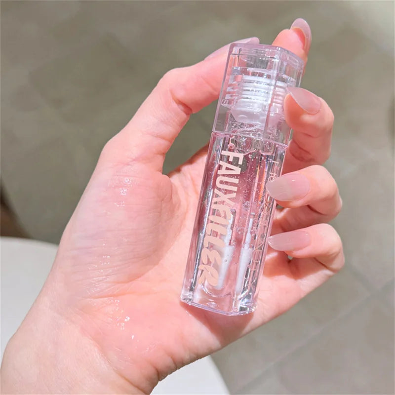 Huda Beauty Faux Filler Brillo de Labios Brillante No Pegajoso, Hidratante, Aceite de Labios Crystal Clear, Efecto Voluminizador y Nutritivo, Maquillaje con Color