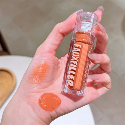 Huda Beauty Faux Filler Brillo de Labios Brillante No Pegajoso, Hidratante, Aceite de Labios Crystal Clear, Efecto Voluminizador y Nutritivo, Maquillaje con Color