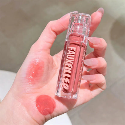 Huda Beauty Faux Filler Brillo de Labios Brillante No Pegajoso, Hidratante, Aceite de Labios Crystal Clear, Efecto Voluminizador y Nutritivo, Maquillaje con Color