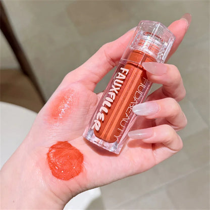 Huda Beauty Faux Filler Brillo de Labios Brillante No Pegajoso, Hidratante, Aceite de Labios Crystal Clear, Efecto Voluminizador y Nutritivo, Maquillaje con Color