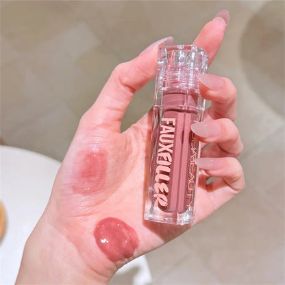 Huda Beauty Faux Filler Brillo de Labios Brillante No Pegajoso, Hidratante, Aceite de Labios Crystal Clear, Efecto Voluminizador y Nutritivo, Maquillaje con Color